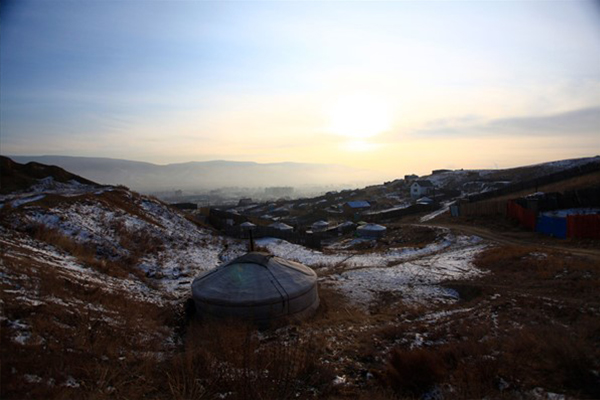 Snowy landscape with Mongolian tent