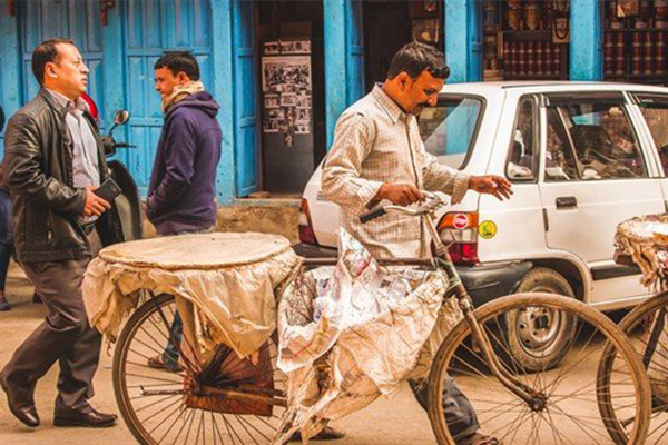 Asian man with bicycle