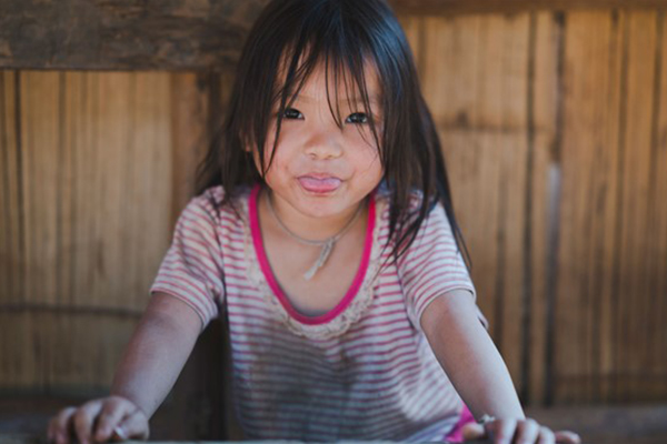 Young Asian girl smiling