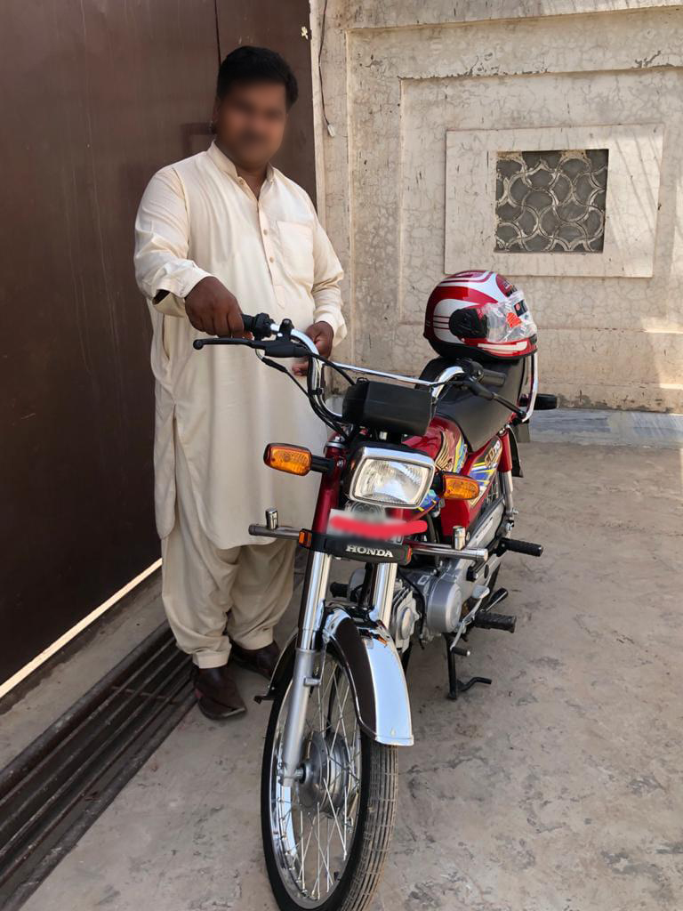 masih with his bike